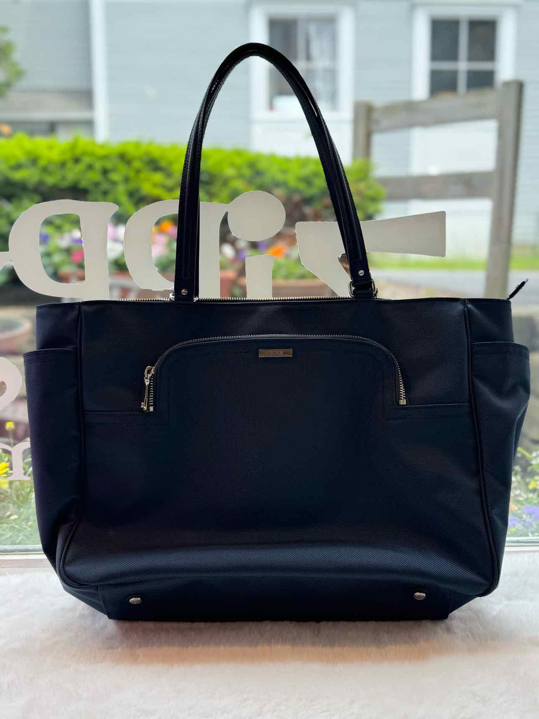 Tumi Navy Pre-Owned Purse- Ladies